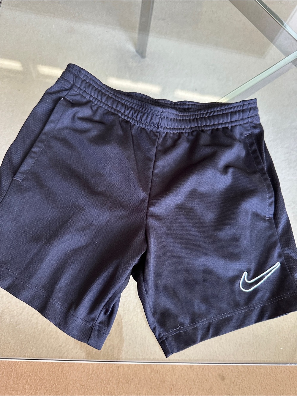 NikeUnisex kids Black Athletic Shorts with White Swoosh